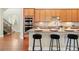Modern kitchen with an island, stainless appliances, and ample counter space at 10003 Atlanta St, Parker, CO 80134
