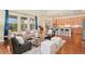 Spacious living room with an open floor plan and hardwood floors at 10003 Atlanta St, Parker, CO 80134