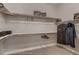 Spacious walk-in closet featuring custom shelving and ample storage space for clothing and accessories at 14111 Blue Stem St, Broomfield, CO 80020