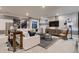 Cozy living room features modern decor, comfortable seating, and a stylish accent wall at 14111 Blue Stem St, Broomfield, CO 80020