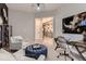 This home office features neutral paint, a modern desk, and stylish decor at 14111 Blue Stem St, Broomfield, CO 80020