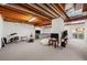 Large basement space with exposed ceiling great for a variety of activies at 10103 Knoll Cir, Highlands Ranch, CO 80130