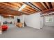 Unfinished basement with exposed ceiling showing lots of potential for a variety of uses at 10103 Knoll Cir, Highlands Ranch, CO 80130
