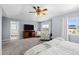 Cozy main bedroom featuring sitting area with neighborhood views at 10103 Knoll Cir, Highlands Ranch, CO 80130