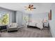 Spacious main bedroom with a ceiling fan and neutral decor at 10103 Knoll Cir, Highlands Ranch, CO 80130