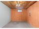 Unfinished basement area with window, concrete floor, and overhead ceiling fan at 12550 Maria Cir, Broomfield, CO 80020