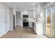 Updated kitchen featuring stainless steel appliances, subway tile backsplash and light wood flooring at 12550 Maria Cir, Broomfield, CO 80020