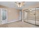 Spacious main bedroom with mirrored closet doors and ensuite bathroom at 12550 Maria Cir, Broomfield, CO 80020