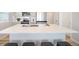 Stylish kitchen island with seating, ideal for meal prep and casual dining at 13616 E 103Rd Pl, Commerce City, CO 80022