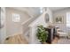 Entryway with staircase, decor, and an accent cabinet at 13616 E 103Rd Pl, Commerce City, CO 80022