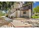 Exterior of a condo with stairs leading to the entrance, and a balcony at 4903 W 73Rd Ave, Westminster, CO 80030