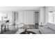 Cozy living room features modern flooring, plenty of storage space, and comfortable seating at 1561 W Beekman Pl, Denver, CO 80221