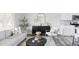 Bright living room boasts modern decor, a comfortable seating area, and an open floor plan at 1561 W Beekman Pl, Denver, CO 80221