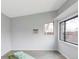 The interior of the outbuilding, featuring a large window, and ample room for activities at 1561 W Beekman Pl, Denver, CO 80221