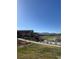 Scenic view of a golf course community with lush green fairways and mountain views at 15274 W 64Th Ln # 206, Arvada, CO 80007