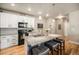 Stylish kitchen boasts stainless steel appliances, granite countertops, and a functional island with seating at 15274 W 64Th Ln # 206, Arvada, CO 80007