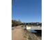 Scenic view of a neighborhood street near a bridge and greenery at 15274 W 64Th Ln # 206, Arvada, CO 80007
