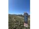 Sign for Ralston Creek Trail with trail information and regulations in a natural setting at 15274 W 64Th Ln # 206, Arvada, CO 80007