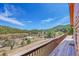 Breathtaking mountain view from a wooden deck, perfect for relaxing and enjoying the scenery at 22349 Natsihi Rd, Indian Hills, CO 80454