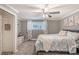 Inviting bedroom with a ceiling fan, a window for natural light, and a comfy bed at 1151 N Marion St # 104, Denver, CO 80218