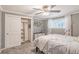 Comfortable bedroom with a ceiling fan, closet, dresser, and window to let the natural light in at 1151 N Marion St # 104, Denver, CO 80218