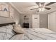 Relaxing bedroom featuring soft bedding, decorative art, ceiling fan, and closet at 1151 N Marion St # 104, Denver, CO 80218