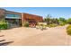 Entrance to the Denver Botanic Gardens with modern architecture, lush greenery, and welcoming walkways at 1151 N Marion St # 104, Denver, CO 80218