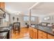 Open-concept view from kitchen to living room; stylish and bright design at 1151 N Marion St # 104, Denver, CO 80218
