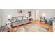 Cozy living room with a plush sofa, hardwood floors, and stylish decor, creating a welcoming atmosphere at 1151 N Marion St # 104, Denver, CO 80218