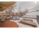 Beautiful outdoor patio with a seating area and lounging chairs, perfect for relaxation at 1151 N Marion St # 104, Denver, CO 80218