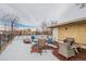 Cozy outdoor patio with furniture, ideal for relaxation or entertaining with skyline views at 1151 N Marion St # 104, Denver, CO 80218
