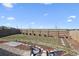 A spacious backyard with wooden fence, rock garden, stone tiles, and outdoor seating at 95 S Edge Cliff St, Castle Rock, CO 80104