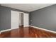 Bedroom features hardwood floors and double door closet at 3283 W 102Nd Pl, Westminster, CO 80031