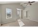 Bedroom with carpet, vaulted ceiling, mirror closet doors, ceiling fan and two windows at 3283 W 102Nd Pl, Westminster, CO 80031