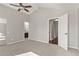 Bedroom with carpet, vaulted ceiling, view of the attached bath and closet at 3283 W 102Nd Pl, Westminster, CO 80031