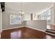 Bright dining room with hardwood floors and contemporary chandelier at 3283 W 102Nd Pl, Westminster, CO 80031