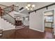 Living room with hardwood floors, fireplace, and staircase view at 3283 W 102Nd Pl, Westminster, CO 80031