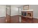 Living room with fireplace, wooden floors and lots of natural light at 3283 W 102Nd Pl, Westminster, CO 80031