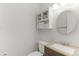 Clean bathroom with modern vanity, mirror and storage offering a functional and stylish space at 944 E Lily Ct, Highlands Ranch, CO 80126