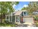 Charming two-story home featuring a well-maintained lawn and a two-car garage at 944 E Lily Ct, Highlands Ranch, CO 80126
