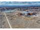Scenic aerial view featuring the recreation center, trails, and a tranquil lake at 18668 E Vassar Dr, Aurora, CO 80013