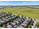Aerial view showcasing the neighborhood and nearby park with walking trails and open green space at 12427 James Ct, Broomfield, CO 80020