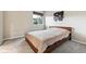 Comfortable bedroom space with soft carpet, natural lighting, and a cozy bed at 12427 James Ct, Broomfield, CO 80020