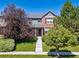 Charming two-story home with a well-manicured lawn and inviting curb appeal at 12427 James Ct, Broomfield, CO 80020