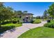 Picturesque community gazebo, surrounded by lush greenery, with a nearby playground for residents at 12427 James Ct, Broomfield, CO 80020