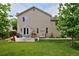 Picturesque backyard featuring a lush lawn, patio seating, and well-maintained landscaping at 13441 Cherry St, Thornton, CO 80241