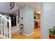 Hallway view of kitchen with stainless steel appliances at 13441 Cherry St, Thornton, CO 80241