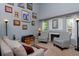 Cozy living room featuring vaulted ceilings, a decorative fireplace, and plenty of seating at 13441 Cherry St, Thornton, CO 80241