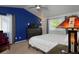 Large bedroom with neutral colors, large windows, and plenty of room at 13441 Cherry St, Thornton, CO 80241