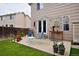Cozy backyard patio, perfect for entertaining and relaxation with a seating area and outdoor decor at 13441 Cherry St, Thornton, CO 80241